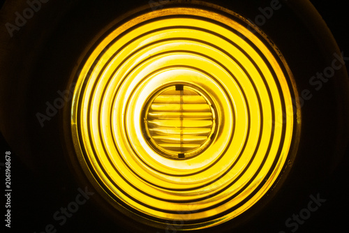Принти на полотні Closeup of bright yellow fresnel light creating an abstract pattern with a serie