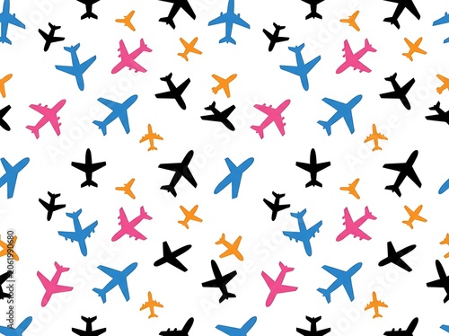 Seamless pattern of colorful airplane silhouettes on white background