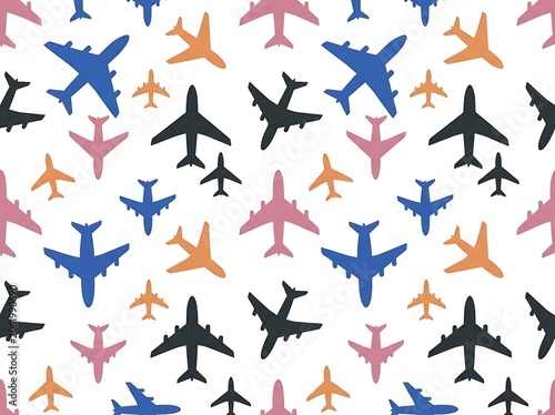 Seamless pattern of colorful airplane silhouettes on white background