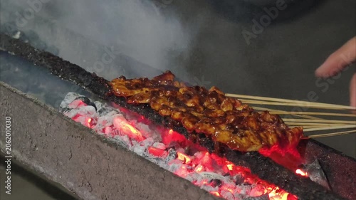 Delicious Satay Skewers Grilling Over Hot Coals.