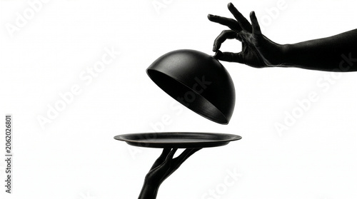 Obraz na płótnie Black Silhouette Hand Lifting Cloche Revealing Empty Tray on White Background, L
