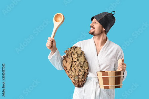 Handsome man with sauna sup...