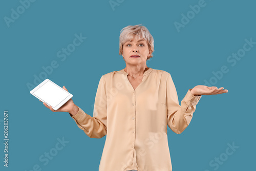 Confused mature woman with ...