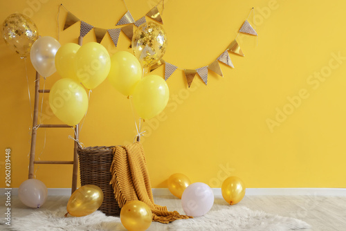 Basket with balloons, ladde...