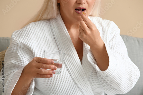 Beautiful mature woman with...
