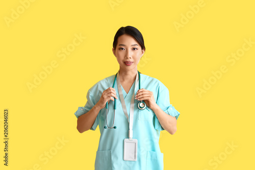 Female Asian medical intern...
