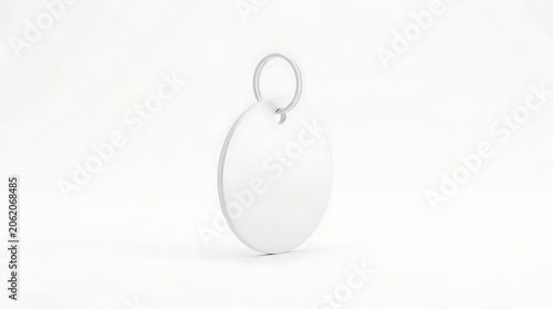 Isolated blank round metal pet ID tag with split ring connector for personalized pet collar engraving mockup template
