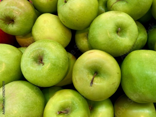 background texture of fresh green granny smith apples