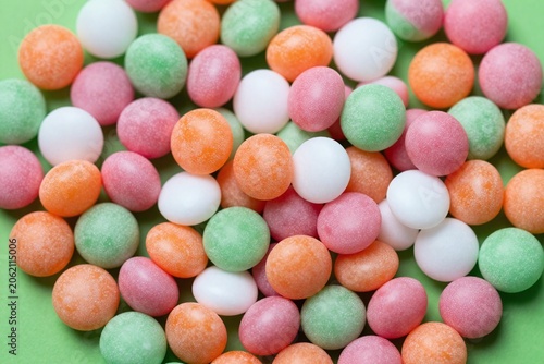 A pile of colorful candies sitting on top of a table