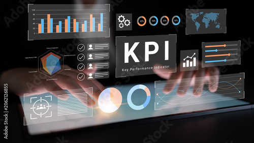 Fotografía Professional hands interact with a digital dashboard displaying various graphs and charts representing key performance indicators to analyze business metrics effectively