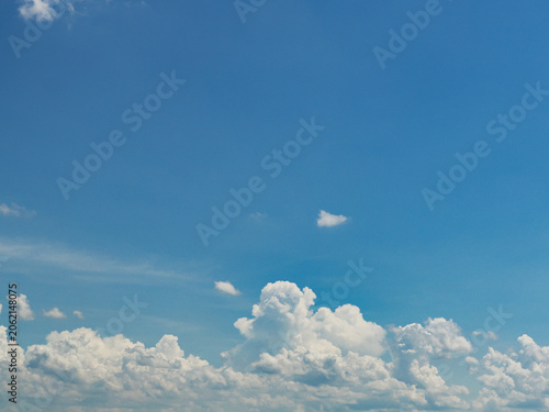 Cuadro en lienzo Cumulus clouds, or good weather clouds, appear on sunny days and have a soft, cotton-like appearance with a flat base