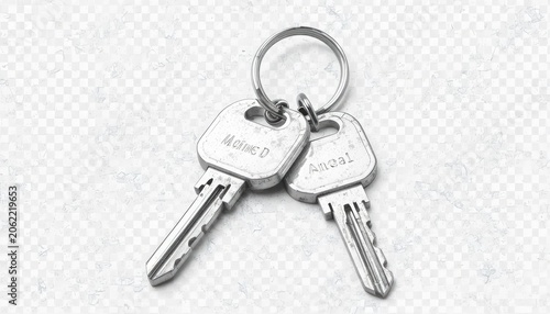 Two metal keys on a keyring with engraved text on a transparent background