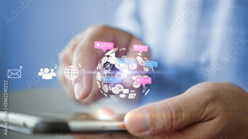 Person Using Smartphone With Social Media Icons
