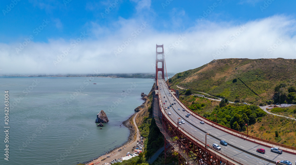 Fototapeta premium Golden Gate Bridge north tower in the fog at San Francisco Bay, city of San Francisco, California CA, USA. 