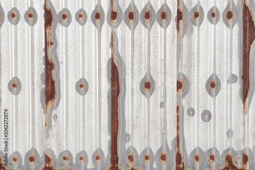 Old zinc surface background or the tin roof background with the rust