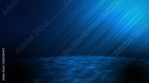 Abstract dark blue glowing background with diagonal light rays
