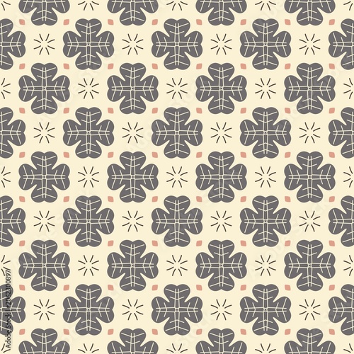 A pattern of flowers and stars is shown on a white background. The flowers are in various sizes and shapes, and the stars are scattered throughout the design