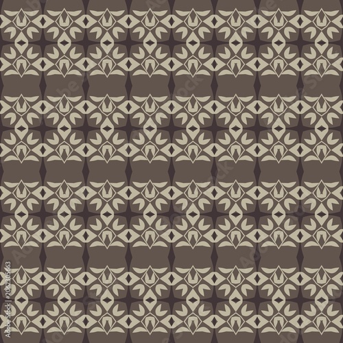 A patterned fabric with a design of flowers and stars. The pattern is made up of squares and triangles