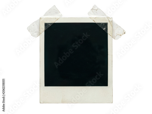 Vintage blank polaroid photo frame with adhesive tape isolated