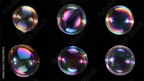 Close up of colorful soap bubbles floating against a black background