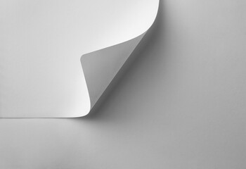 Blank white paper corner page curl with gray background reveal mockup