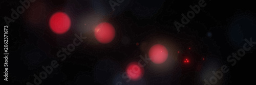 Foto Red Bokeh Lights on Black Background