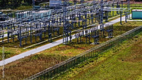 Foto Aerial View of Large Electrical Substation in Forest Landscape