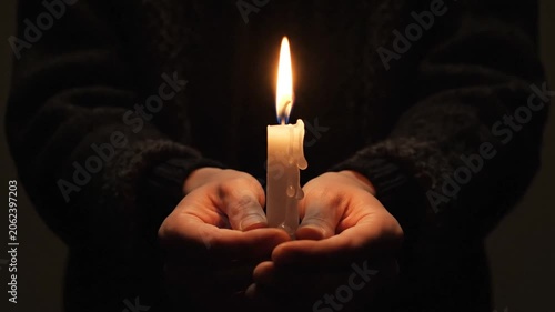 Person Holding Candle in Dark Room Ages Lantern Flame Observing Candlelight