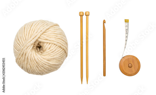 Thick yarn ball and wooden knitting tools isolated on transparent background