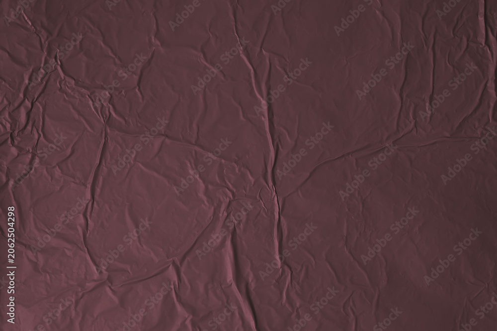 Fototapeta premium Crumpled black red texture background with matte wrinkled surface