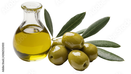Photos Green olives with olive oil in a glass cruet and olive leaves
