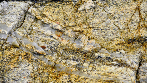 Quadro su tela Geology: An illustration of different mineral compositions and the deformation of rock strata formed over millions of years