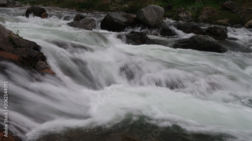 Принти на полотні Beautiful silk-like mountain stream rushing over rocks