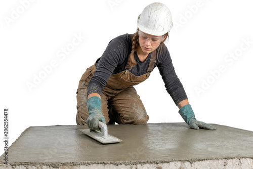 Female Construction Worker Smoothing Fresh Wet Concrete with Trowel