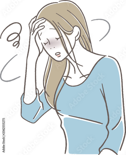 目眩がする女性
