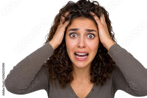 Portrait of Stressed Woman Panicking and Holding Her Head in Shock