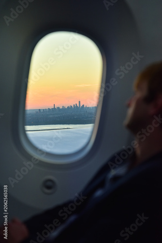 East River and Manhattan Skyline with Sunrise as seen from a Plane, New York City, USA