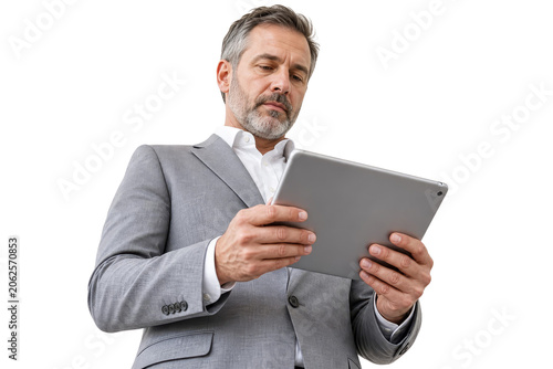 Successful Mature Businessman in Grey Suit Using Digital Tablet Portrait