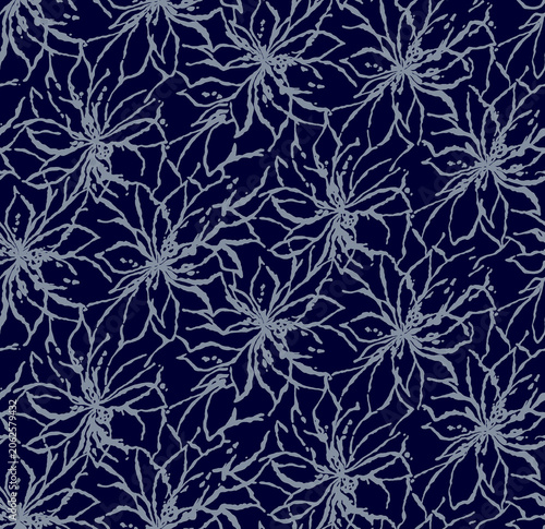 Seamless snowflake pattern on dark blue background