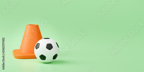 Minimalist 3D illustration of soccer ball and orange training cone for sports practice concept