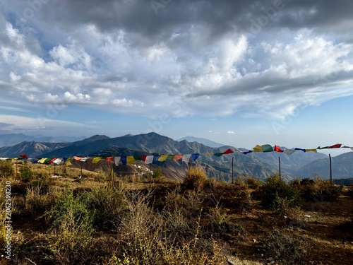 Nature Panorama of Mountains, White Clouds, and Blue Sky