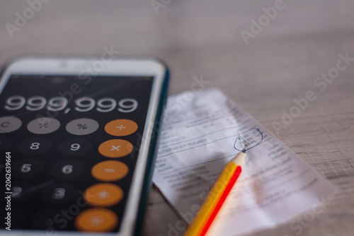 Expense bills and income records used for budgeting financial planning and cost management tasks.