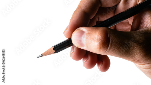 Hand holding black graphite pencil for writing or drawing