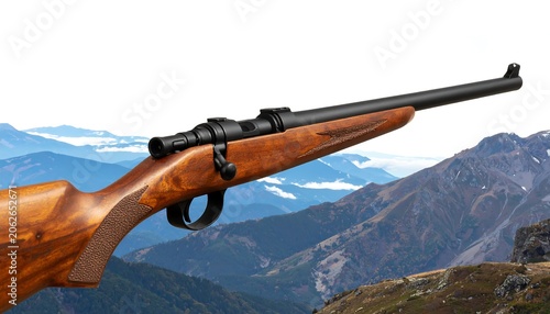 Wooden hunting rifle against mountain backdrop