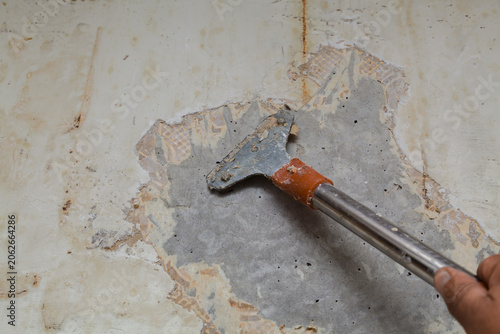 scraper for removing old wallpaper and old plaster from the wall