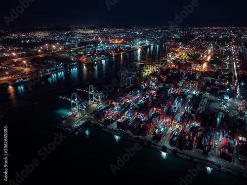 Industrial Shipping Terminal Illuminated At Night Featuring Gantry Cranes And Cargo Containers In Laem Chabang Chon Buri Thailand
