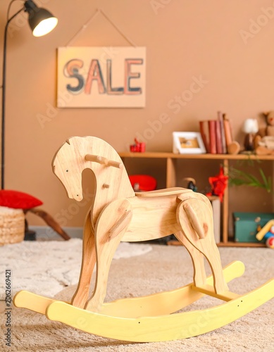 Wooden rocking horse in child's room