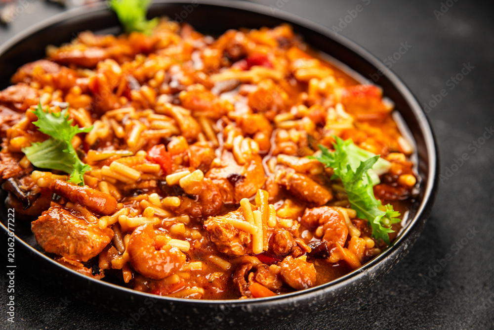 Fototapeta premium chicken and shrimp dish, tomato sauce fresh seafood tasty snack fresh delicious gourmet food background rustic food on the table, top view, copy space