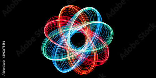 Abstract light forming a colorful atomic or orbital shape against a black background.