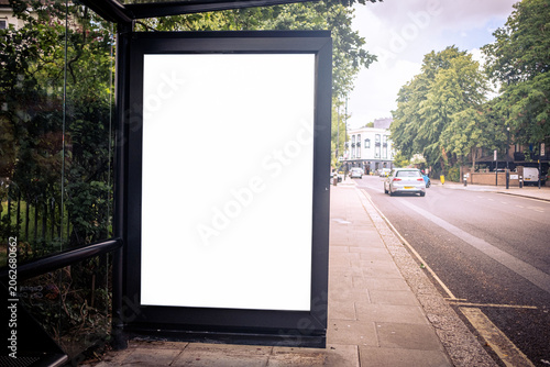 LONDON - blank advertising panel at bus stop on city street